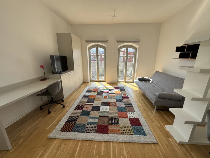Stilvolles Single-Apartment - möbliert mit großzügiger Einbauküche und sonnigem Balkon — photo 1